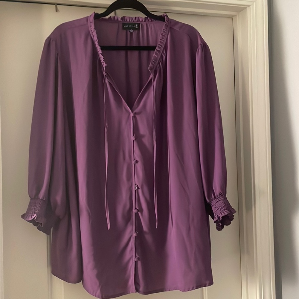 Beautiful purple blouse by Ryan Wylde in 3X. Ruffle tie collar & elastic sleeves